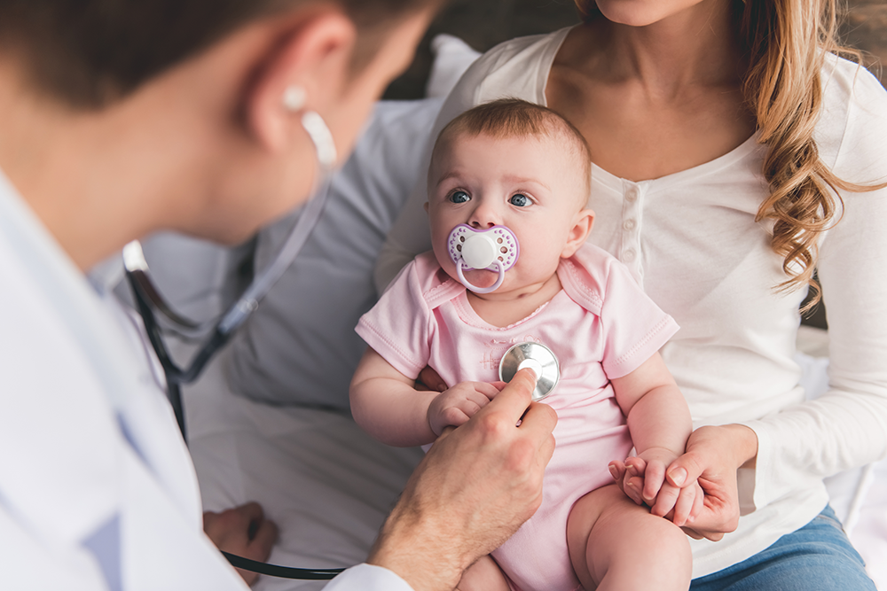 Family Doctor treating a baby